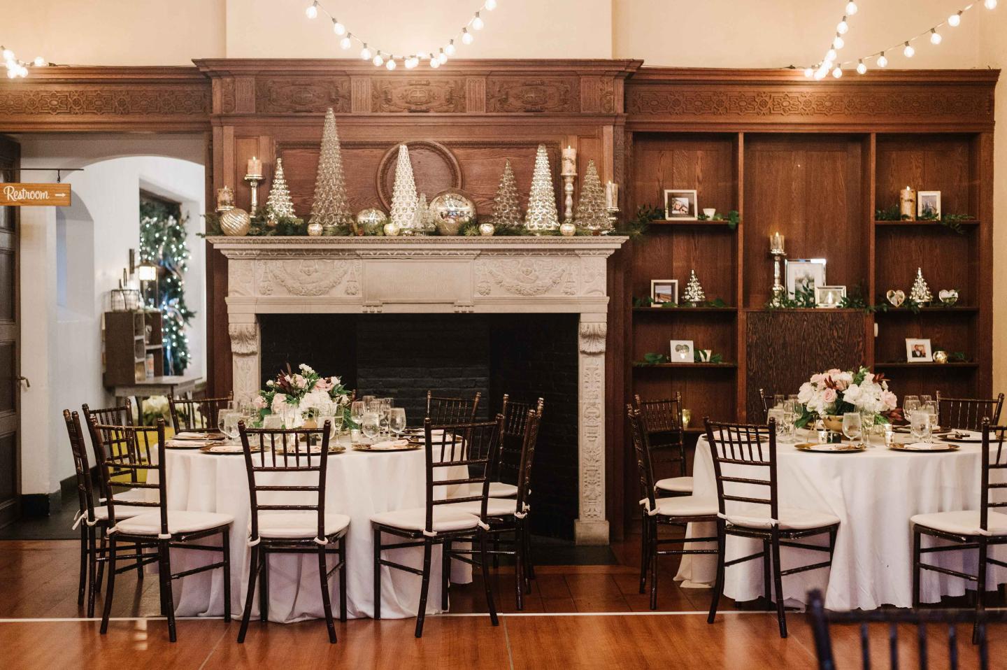 Wedding dinner setup with fireplace