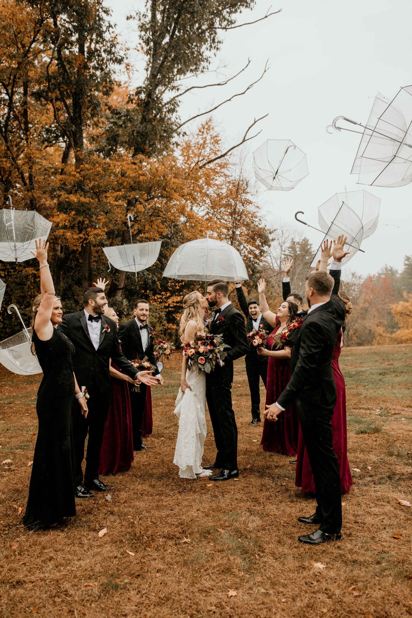 People throwing umbrellas